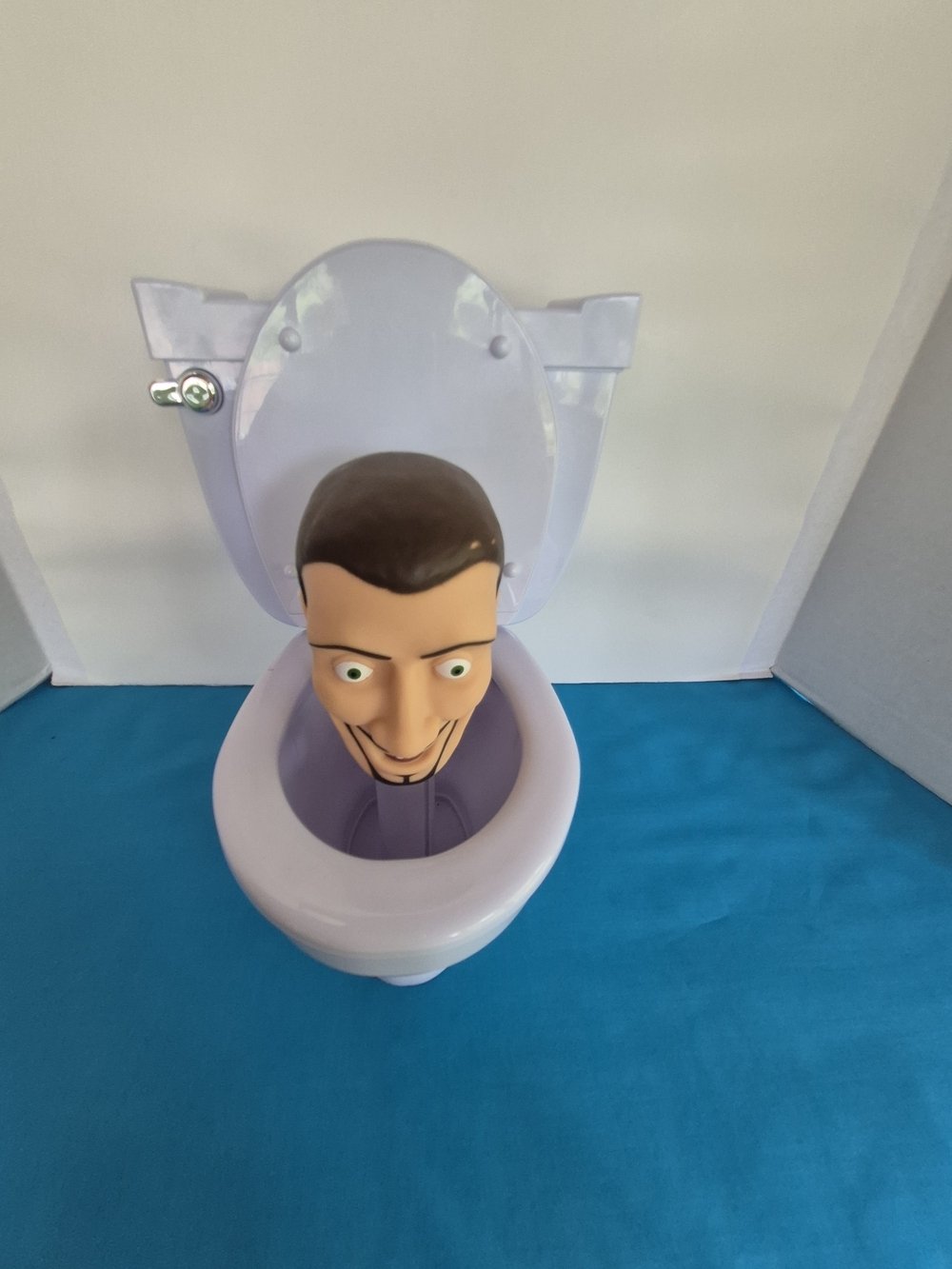 Toilet with Mans Head Pops Up Toy Flushing Sound by Skibidi Entertaining